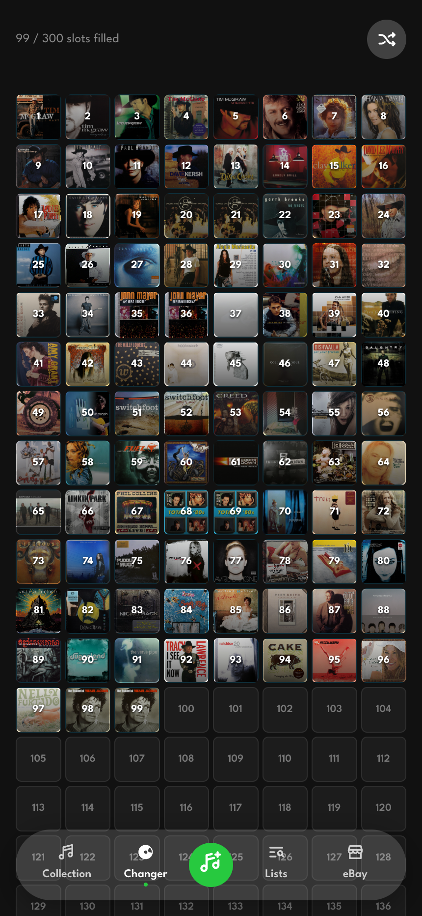 The 300-slot changer drawn as a grid, filled slots showing cover art and a count of slots loaded